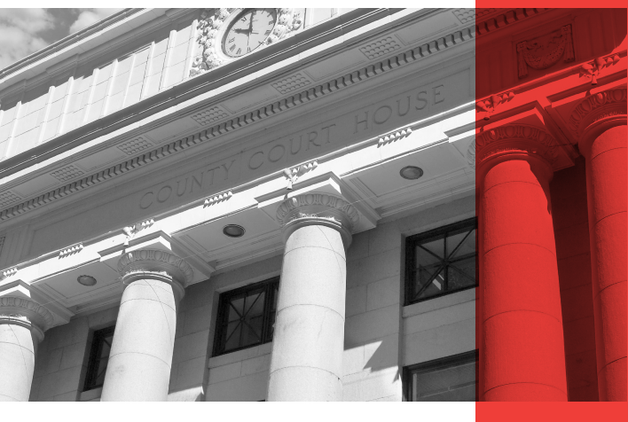 A black and white image of a courthouse