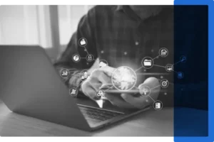 A black and white image of a laptop with artificial intelligence icons